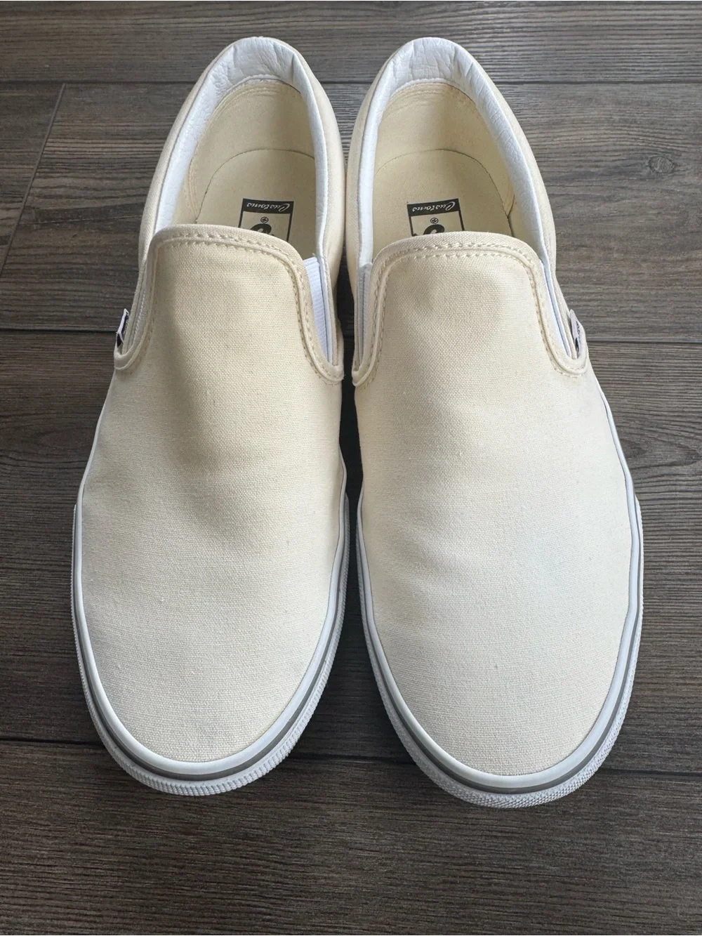 Vans Slip-On Canvas Sneakers in Cream
